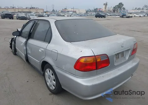 1999 Honda Civic Value Package из США, поврежденный, VIN 2HGEJ6610XH532359
